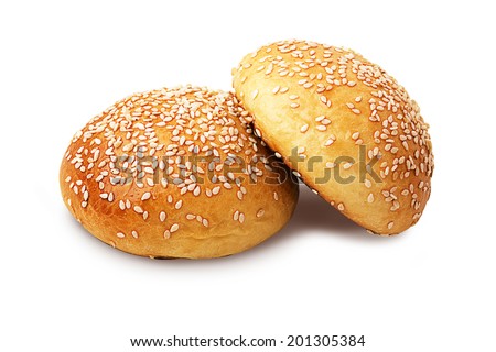Two whole buns with sesame seeds isolated on white Royalty-Free Stock Photo #201305384