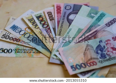 Old Brazilian banknotes invalidated by inflation. From cruzeiro to cruzados novos . An Old paper banknote, vintage retro. Royalty-Free Stock Photo #2013055310