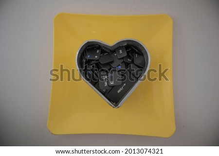 Keybord key on a love board shape