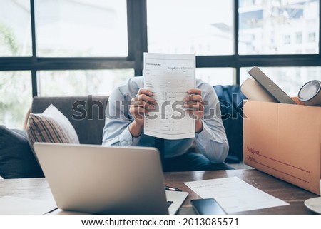 Business people  unemployed, worrying, stressful, headache, worrying when applying employment application for a new job.
job vacancy, job application concept.