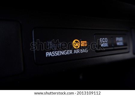 Close up interior dashboard view of the car, Passenger air bag system. Eco Mode

