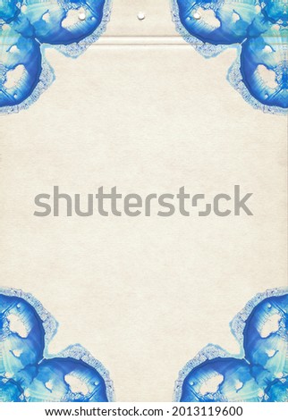 A sheet of notebook stained with blue watercolor spots. Artistic template for creative design.