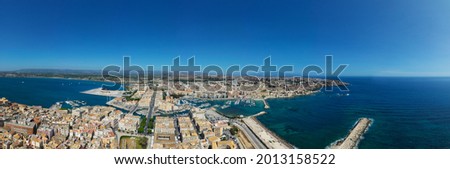 180 degree drone photo of the island of Ortigia, a world heritage jewel. The beauty of the Temple of Apollo, Maniace Castle, Duomo, Fonte Aretusa, Piazza Archimede in Syracuse.