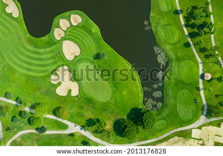 Golf course beautiful Aerial view of golf field landscape with sunrise view in the morning shot. Bangkok Thailand