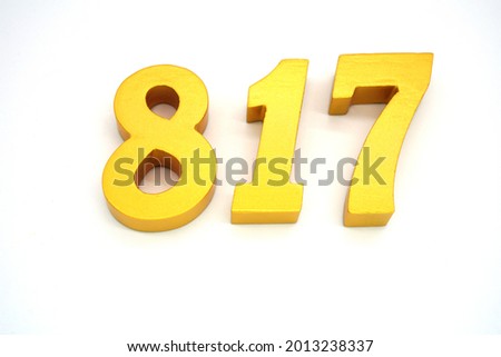   Arabic numerals 817 gold on white background                             
