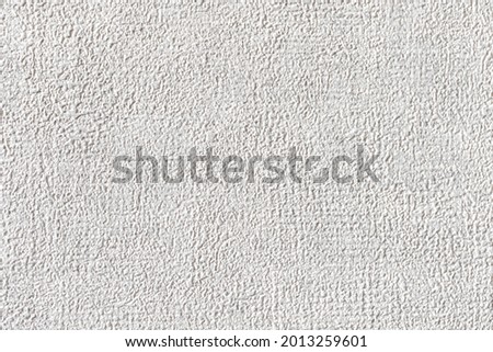 Grunge white texture background, rough white surface close-up photo