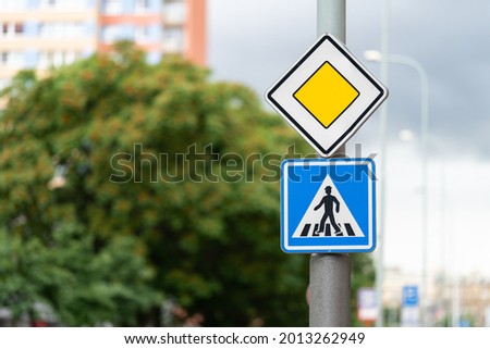 Traffic sign pedestrian crossing. Priority road.