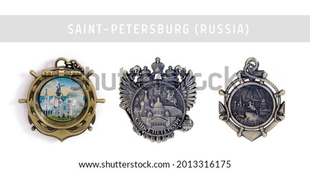 Souvenirs (magnets) from Russia isolated on white background. Russian inscription does the city name "Kronstadt" and "Saint-Petersburg" in English
