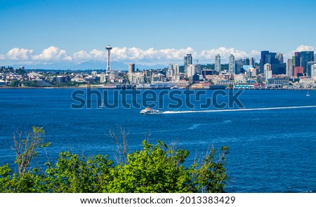 A view of Elliottt Bay and the Seattle skyline. Royalty-Free Stock Photo #2013383429