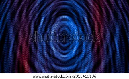 Abstract blue and red shiny particles forming rings and effect of deep tunnel. Motion. Colorful dots forming circles on black background.