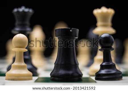 Chess Pieces Arrayed for Battle on a chessboard