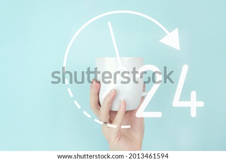 Full time service concept. Cropped view of female hand with white coffee cup and sign Icon on blue background. Business button 24 hours service. Royalty-Free Stock Photo #2013461594