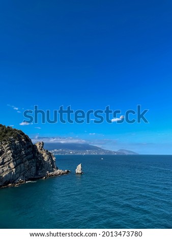 Scenic View Of Sea Against Clear Blue Sky - stock photo. High quality photo