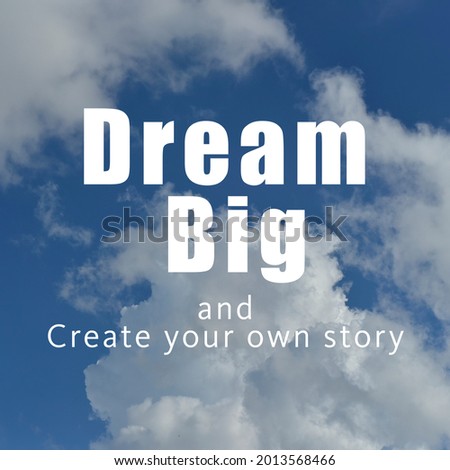 Inspirational motivation quote   "Dream Big and Create your own story" on blue sky and clouds as background. 
