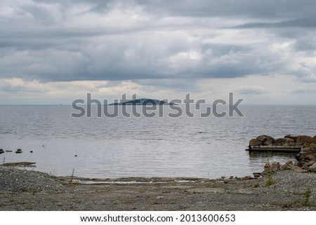 A beautiful seashore with a dramatic sky in the background. Picture from the Baltic Sea