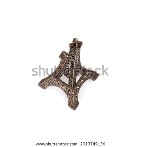 Miniature model of the Eiffel Tower (France, Paris) isolated on a white background