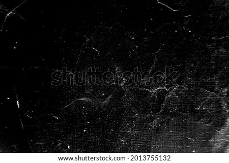 Black and white grunge background. Texture of chips, cracks, scratches, scuffs, dust, dirt. Dark monochrome surface. crack texture
 Royalty-Free Stock Photo #2013755132