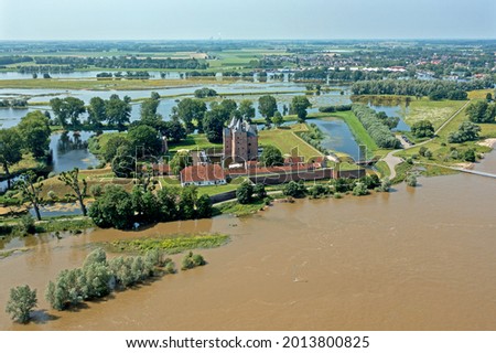 Aerial view from castle Loevestein in a flooded landscape in the Netherlands