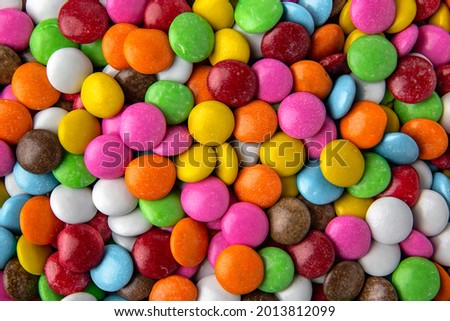 Glazed chocolates. Sweet dragees. Desserts for Candybar. Small multi-colored round candies.