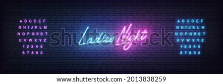 Ladies Night neon template. Glowing neon lettering Ladies Night sign Royalty-Free Stock Photo #2013838259