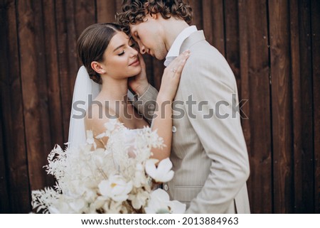 Young wedding couple on their wedding Royalty-Free Stock Photo #2013884963