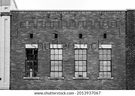 Vintage windows and brick facade in old town Rock Hill, South Carolina, USA