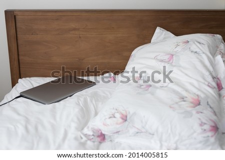 View of a lap top in a bed