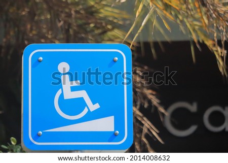 handicap sign on wheelchair with soft focus