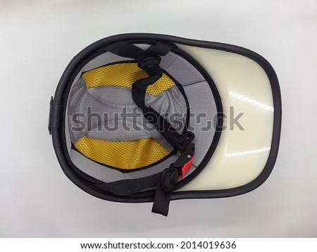 Black Bicycle Plastic Cap for Travelling Sport Head Safety Protection in White Isolated Background
