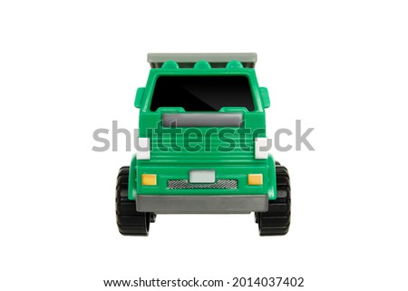 Toy dump truck for kids to play and enhance their learning Green truck with gray tray isolated on a withe background 