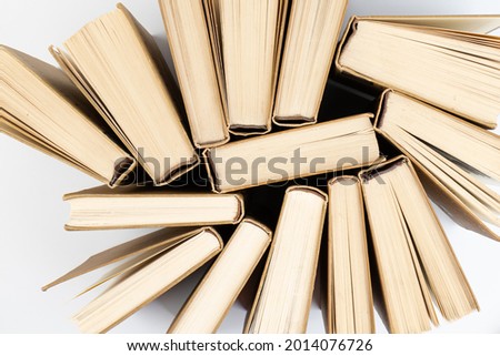 a stack of books on white. background from books. Books close up