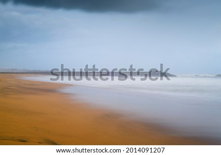 Breathtaking landscape scenery in the paradise island of Sri Lanka, long exposure sandy beach photograph.