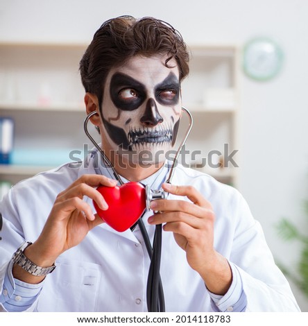 Scary monster doctor working in lab Royalty-Free Stock Photo #2014118783