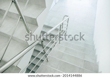 Photo of renovated stairs in old office building.