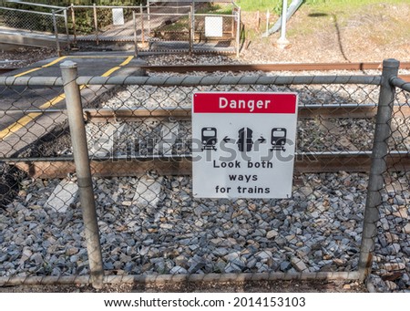 A warning sign at a pedestrian railway crossing in South Australia