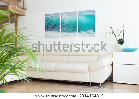 Sample photography artwork printed on canvas hanging on the wall in living room