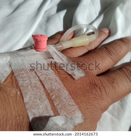 the hand with the infusion attached is excellent for health-themed pictures