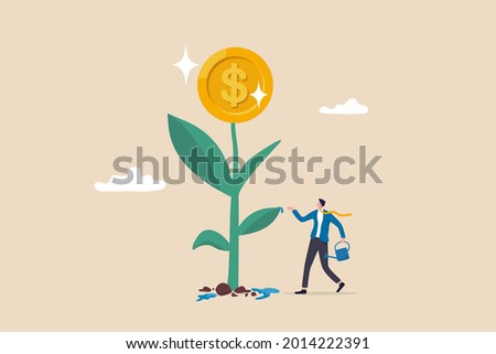 Financial or investment growth, increase earning profit and capital gain, success in wealth management concept, smart businessman investor finish watering growing money plant seedling with coin flower Royalty-Free Stock Photo #2014222391