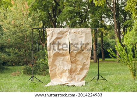 cardboard background for a photo shoot in the park in summer