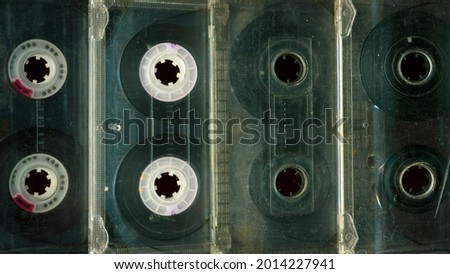 Set old audio cassette tapes collection.Top view on vintage media devices, copy space on labels, flat lay. 80s retro music background.  