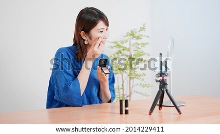 Beauty image of a woman who broadcasts live