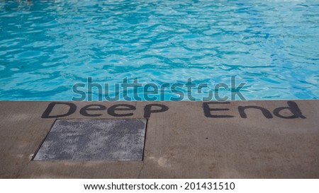 Sign marking deep end of swimming pool Royalty-Free Stock Photo #201431510