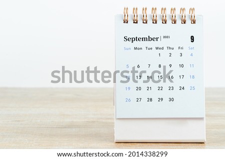 September Calendar 2021 on wooden table background. Royalty-Free Stock Photo #2014338299