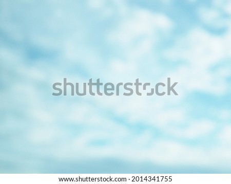 Blurred blue sky with white clouds for nature background concept or life philosophy quotes theme. (space for text, layout design template)