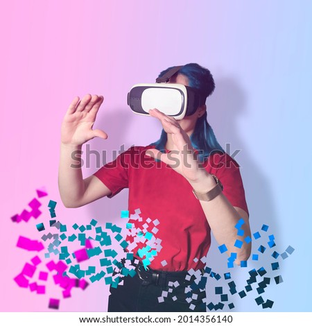 Young lady in VR glasses, isolated on a neutral background, crumbling into pixels. Experience in virtual reality, interaction with objects. Teleportation to virtual reality. Dissolve into pixels 