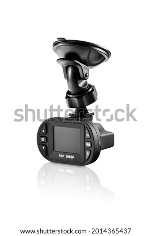 Three-quarter view of black automobile camera with suction holder on white background with reflection underneath