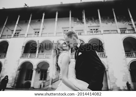 Caucasian happy romantic young couple celebrating their marriage. Outdoor