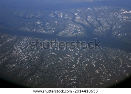 plane view of korea incheon in winter iced river frozen sea