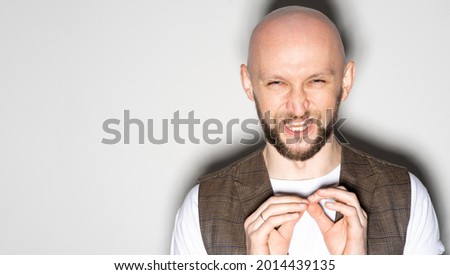 Sardonic man. Psychology disorder. Sneering face. Scheming expression. Negative role. Crazy ridiculous guy enjoying devious plan looking at camera isolated white copy space. Royalty-Free Stock Photo #2014439135