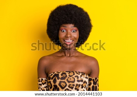 Photo of impressed pretty dark skin lady wear off-shoulders clothes big eyes smiling isolated yellow color background